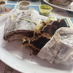 And NO i didn't bite it my Lil cousin ate it because she was hungry and I had already paid for it but it was to burnt for her to finish it