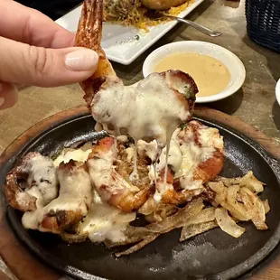 Heaven!!!! 6 huge gulf coast shrimp wrapped in bacon with cheese and  jalapeño served with butter wine sauce