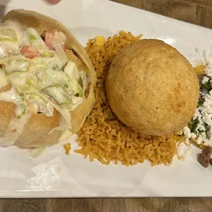Stuffed avocado platter with street taco and crispy stuffed tostadas