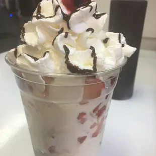 an ice cream sundae with a cherry on top
