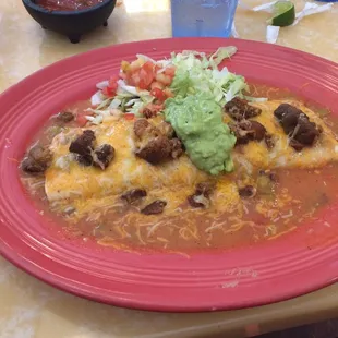 Smothered beef and bean burrito with chicharrones. Delicious!! I devoured it!
