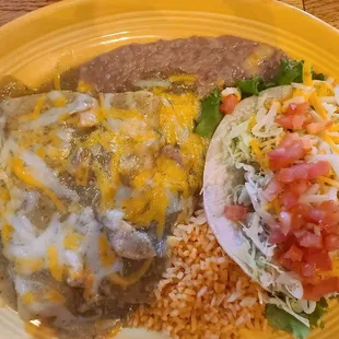 Enchiladas with green sauce and soft taco combo.