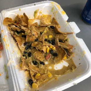 nachos in a styrofoam container