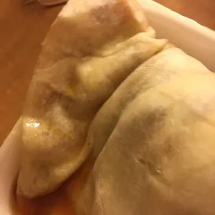 a close up of a burrito