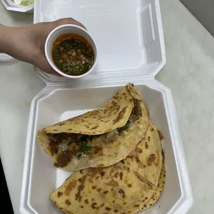 quesabirrias in a flour tortilla