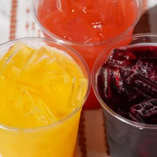 Agua frescas freshly made daily with natural, whole fruit for a refreshing and authentic taste.
