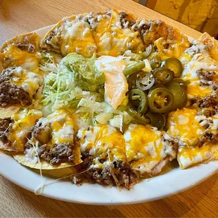 Nachos topped with picadillo. They don't skimp on the meat!