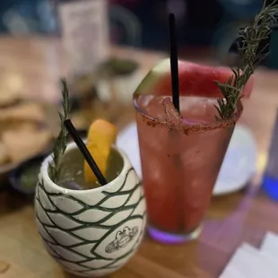 a drink with a garnish