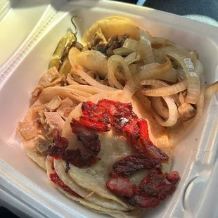  a meal in a styrofoam container