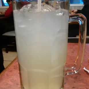 a tall glass filled with ice