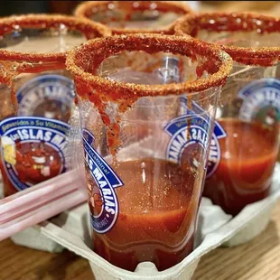 a close up of a carton of salsa