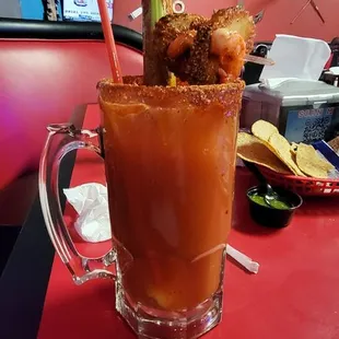 a bloody drink with a straw