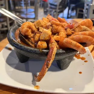 Molcajete Kora.  It was a succulent and spicy mix of large shrimp, mussels, and crab legs in a spicy red sauce called el Nayarit.