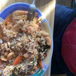 a plate of rice and vegetables