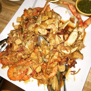 Omg a lot of seafood. This was amazing. Crab, octopus, clam, mussels, shrimp. And who knows what else!