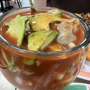 Oysters, clams, shrimp, scallops, surimi, avocado cocktail.