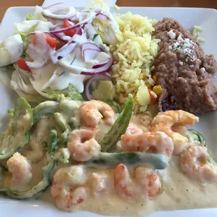 Shrimp in a creamy cheesy sauce, excellent!