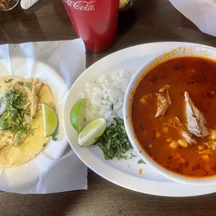 Shredded chicken taco on flour and pozole.