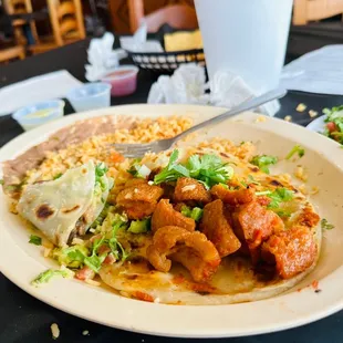 Taco Special, 3 tacos w/ rice and beans. This is chicharrón and carnitas