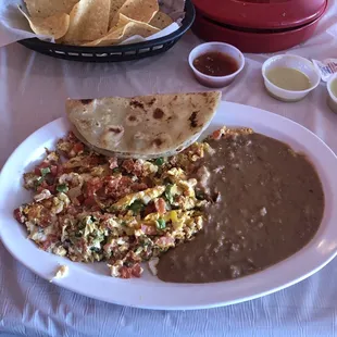 Huevos Mexicana with fresh, homemade flour tortillas.