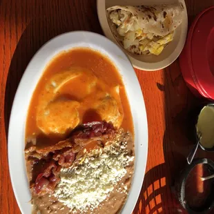 Huevos rancheros and potatoe and egg taco