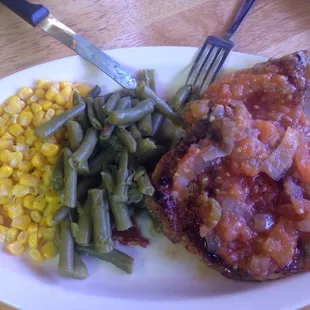Pork Chops and Salsa with a side of corn and green beans.