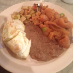 Chicharron, eggs, beans and a side of papas a la Mexicana.