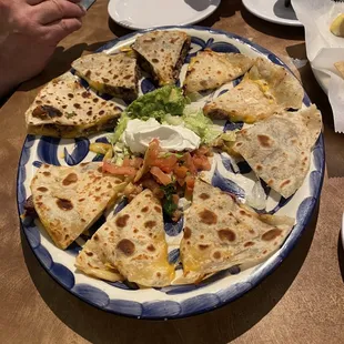 Mixed order of quesadillas....order arrived all beef and 2 pieces with only 1 piece of meat