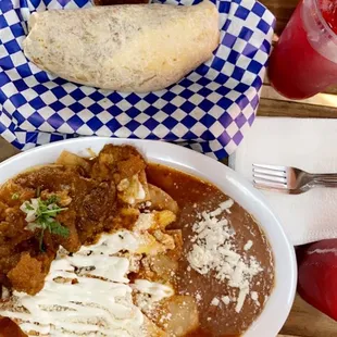 (Top) Chile verde burrito (bottom) medium spice chilaquiles with eggs mixed in.