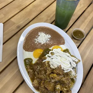 Chilaquiles Deluxe, chili verde with green sauce and cucumber lime fresca.