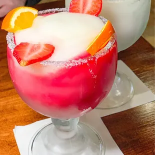 Prickly Pear Margarita (front), House Margarita (back) (@paigeeatshouston on IG)