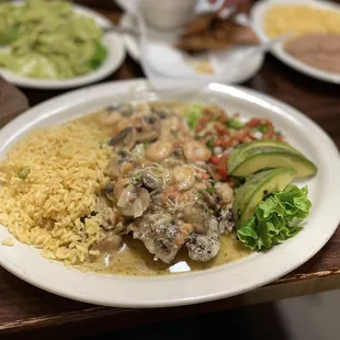 Red snapper with mushrooms and shrimp.