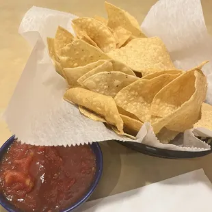 Obligatory chips and salsa. Add some Yucatero Habanero sauce from the bottles on the table to spice it up a little more.