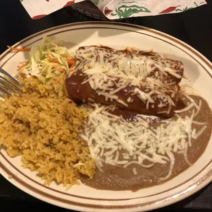 Mole enchiladas with refried beans and rice. 10/10 recommend.