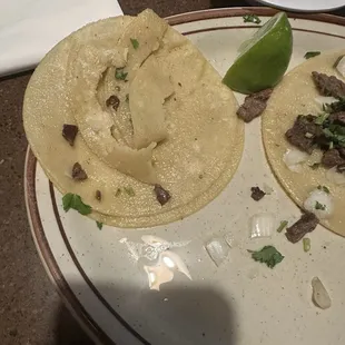 This Tacos  here are garage it's all oil not cooking right I gave this place a half of 1 star