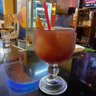 a close up of a drink on a bar