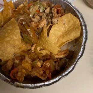 Disappointed! Cheese-less fajita nachos. Please let your customers know if you can&apos;t fulfill their order as specified.