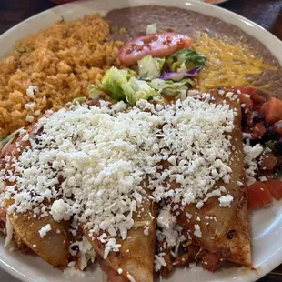 Tacos al Carbon: 
 chicken breast flame broiled, sliced and folded into soft corn tortillas with salsa Mexicana