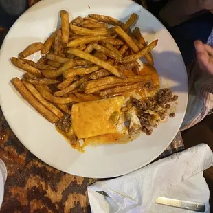 Half-eaten Beef Burrito kids meal with fries