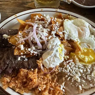 Chilaquiles con asada is a must