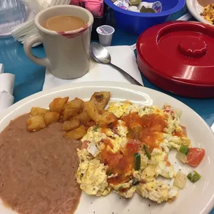 Huevos a la mexicana were delish. I really wanted to order potatoes then was delighted when my plate was served with potatoes! Score!!!