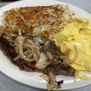 Steak &amp; eggs with well done hash browns. Thumbs up from my husby.