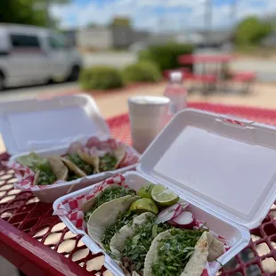 two takeout containers on a table
