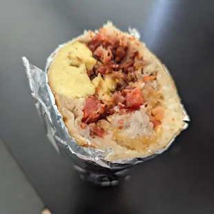 Custom breakfast burrito (eggs, tater tots, pico, bacon, cheese)