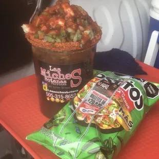 a drink and a bag of chips