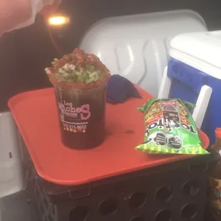 a person holding a drink