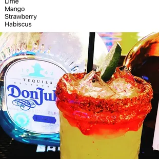 a margarita with a lime garnish