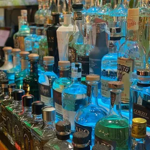 a variety of liquor bottles