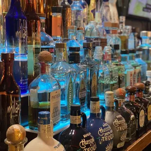 a variety of liquor bottles