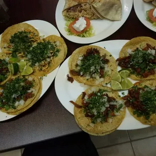 plates of mexican food on a table